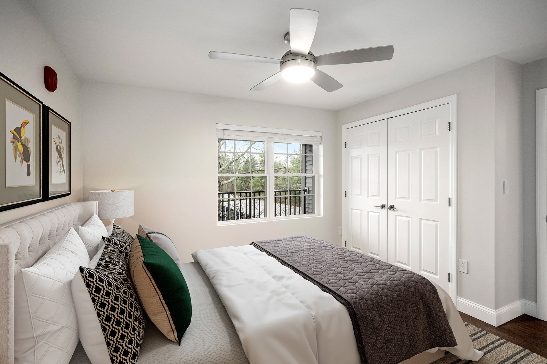 Bedroom with lighted ceiling fan - Hampshire Green Apartments